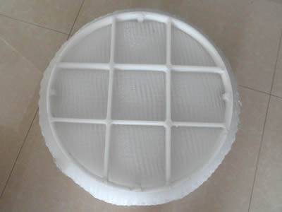 A round polypropylene demister pad is cut into 3 parts and the PP grid is divided into 40 sections.