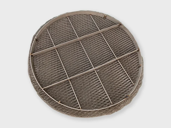 Circle shape SS demister pad with support grid.