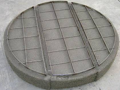 A drawer demister pad with stainless steel grating.