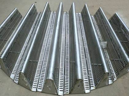 A piece of stainless steel multi-beam packing support on the ground.