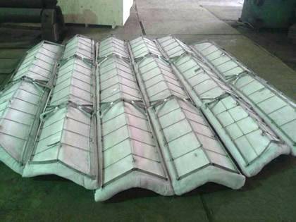 A wavelike type PE demister pad with stainless steel gratings on the ground.