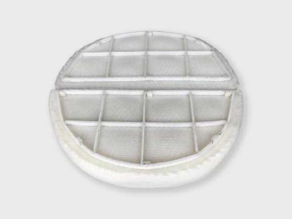 A integrated PTFE demister pad on the white background.