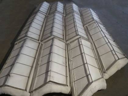 A wavelike type PVC demister pad on the ground.