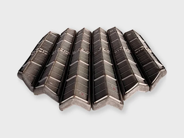 A wavelike type stainless steel demister pad with four parts.